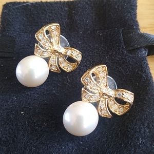 Gold pierced earrings with rhinestones and pearls